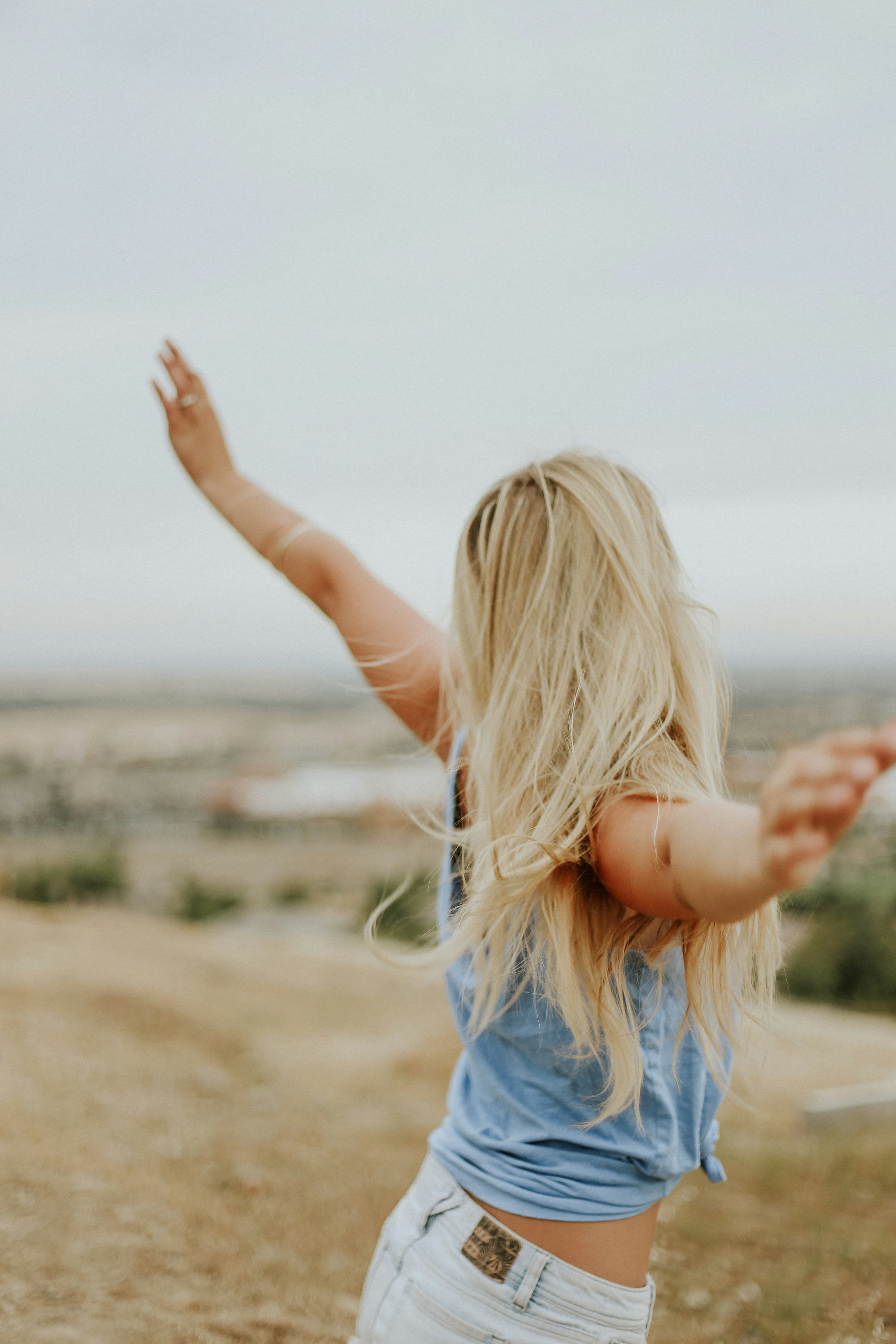 Open hands reaching toward sunlight — hope and integrative cancer support